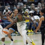 
              Seattle Storm guard Jewell Loyd (24) drives to the basket past Chicago Sky forward Candace Parker (3) during the first half of a WNBA basketball game Wednesday, May 18, 2022, in Seattle. (AP Photo/Ted S. Warren)
            