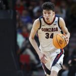 
              FILE - Gonzaga center Chet Holmgren brings the ball up against Georgia State during the second half of a first-round NCAA college basketball tournament game March 17, 2022, in Portland, Ore. Holmgren is one of the top forwards in the upcoming NBA draft. (AP Photo/Craig Mitchelldyer, File)
            