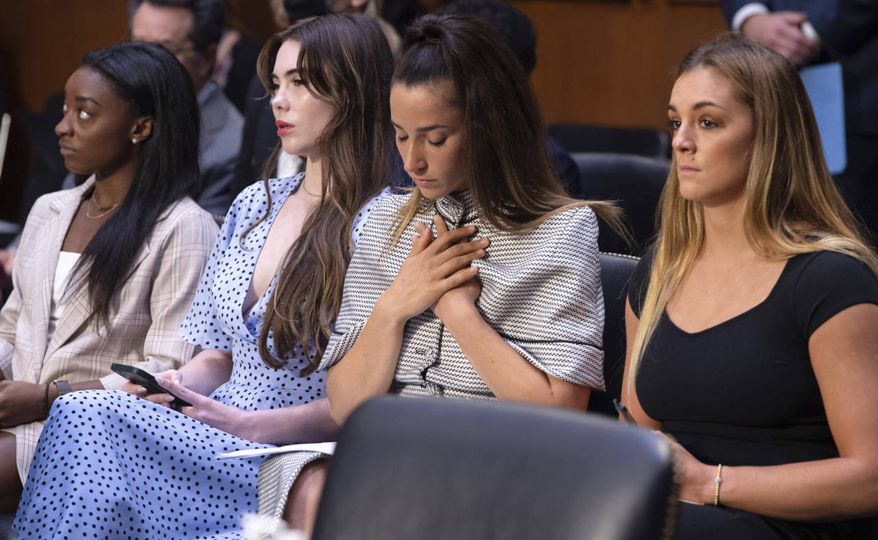 FILE - United States gymnasts from left, Simone Biles, McKayla Maroney, Aly Raisman and Maggie Nich...