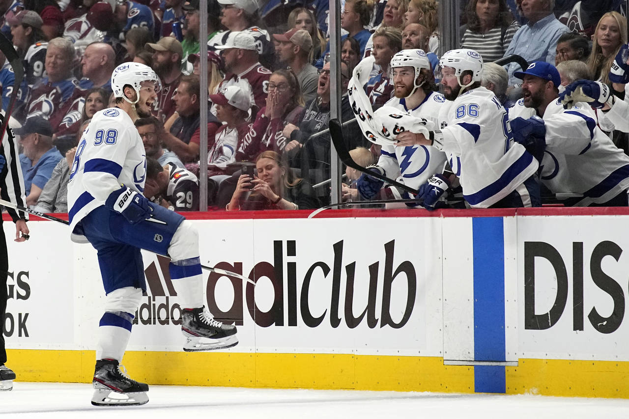 Tampa Bay Lightning defenseman Mikhail Sergachev (98) celebrates his goal against the Colorado Aval...
