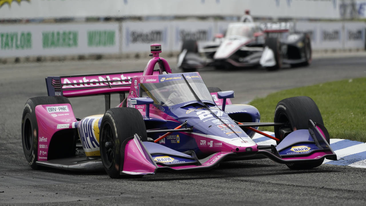 Alexander Rossi (27) races during the IndyCar Detroit Grand Prix auto race on Belle Isle in Detroit...