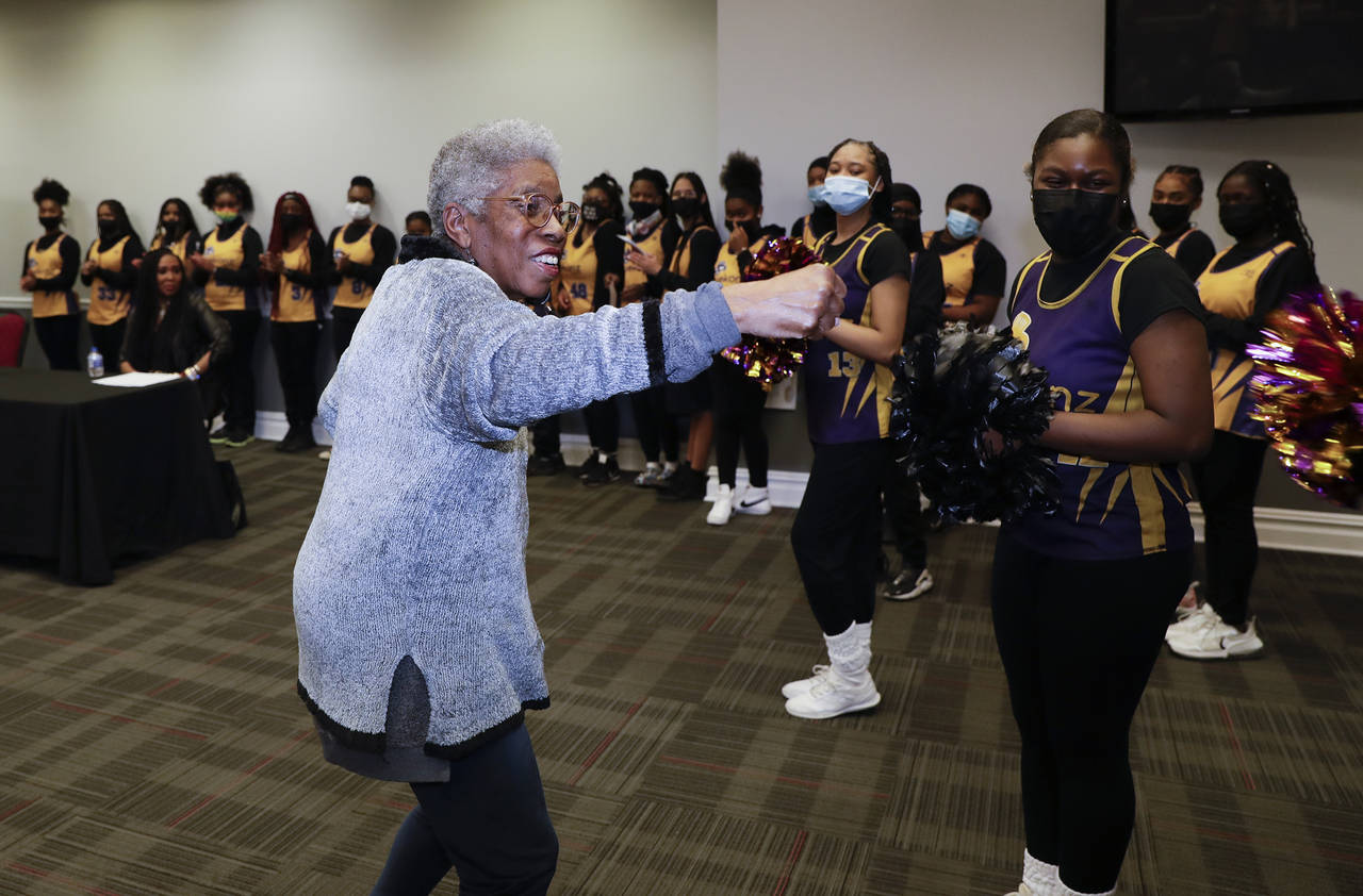 Former Temple lacrosse head coach Tina Sloan Green puts out her fist after announcing she will serv...