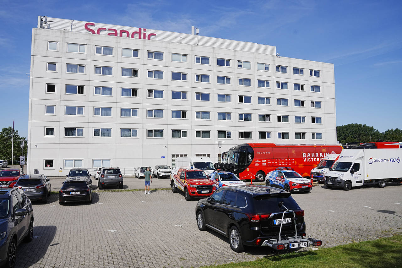 Bahrain Victorious staff outside their hotel in Glostrup, Denmark, Thursday, June 30, 2022. The Bah...