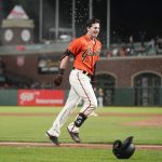 
              San Francisco Giants' Mike Yastrzemski celebrates after hitting a game-winning grand slam against the Milwaukee Brewers during the ninth inning of a baseball game in San Francisco, Friday, July 15, 2022. The Giants defeated the Brewers 8-5. (AP Photo/Godofredo A. Vásquez)
            