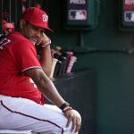 
              Washington Nationals manager Dave Martinez sits in the dugout in the sixth inning of the second game of a baseball doubleheader against the Seattle Mariners, Wednesday, July 13, 2022, in Washington. (AP Photo/Patrick Semansky)
            