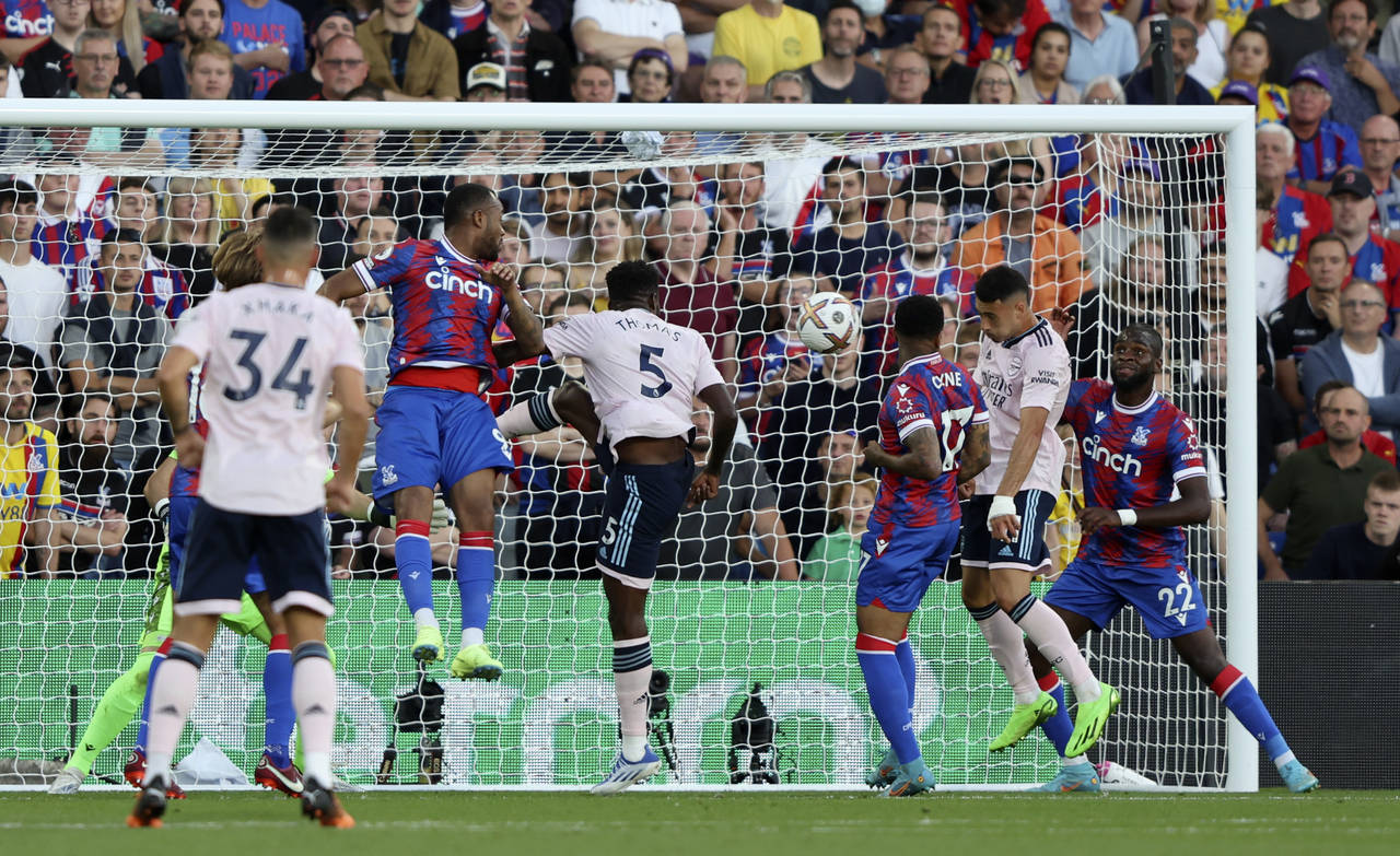 Arsenal's Gabriel Martinelli, second right, scores his side's opening goal during the English Premi...