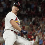 
              St. Louis Cardinals' Tyler O'Neill celebrates as he rounds the bases after hitting a three-run home run during the eighth inning of a baseball game against the Atlanta Braves Sunday, Aug. 28, 2022, in St. Louis. (AP Photo/Jeff Roberson)
            