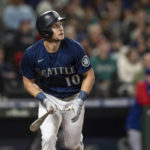 
              Seattle Mariners' Jarred Kelenic watches his home run against the Texas Rangers during the sixth inning of a baseball game Thursday, Sept. 29, 2022, in Seattle. (AP Photo/Stephen Brashear)
            