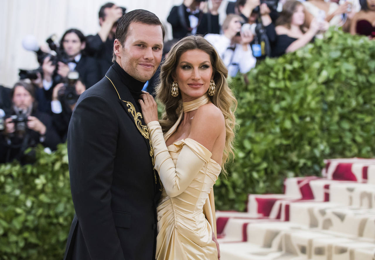 FILE - Tom Brady and Gisele Bundchen attend The Metropolitan Museum of Art's Costume Institute bene...