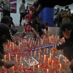 Indonesia soccer group: Some gates locked in deadly crush