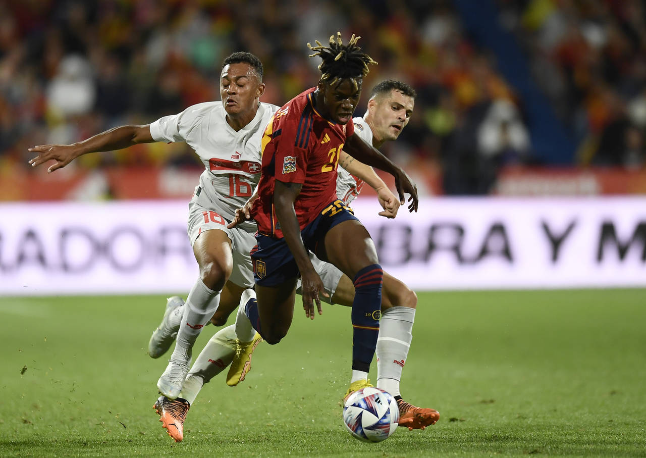 FILE - Spain's Nico Williams, centre, in action during the UEFA Nations League soccer match between...