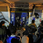 Indonesia soccer group: Some gates locked in deadly crush