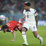 AP PHOTOS: World Cup highlights from Day 2