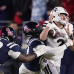 Rogers leads Mississippi State past No. 20 Ole Miss 24-22
