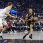 Stephen Curry scores 33 points as Warriors beat Jazz 129-118