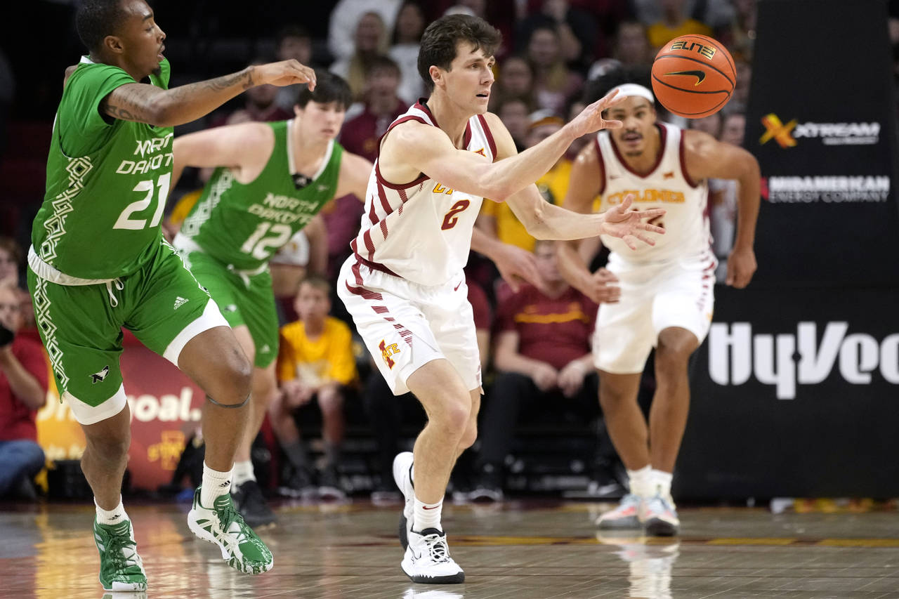 Iowa State guard Caleb Grill (2) steals the ball from North Dakota forward A'Jahni Levias (21) duri...
