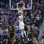 Stephen Curry scores 33 points as Warriors beat Jazz 129-118