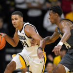Murray has career night: 31 points, 20 rebounds in Iowa win