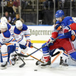 Oilers score 4 times in third period to defeat Rangers