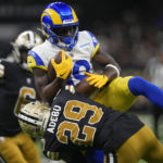 Dalton thrives, Stafford leaves, as Saints top Rams 27-20