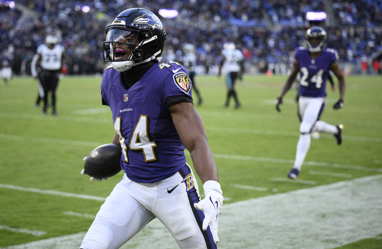 Baltimore Ravens cornerback Marlon Humphrey (44) celebrates an interception in the second half of a...