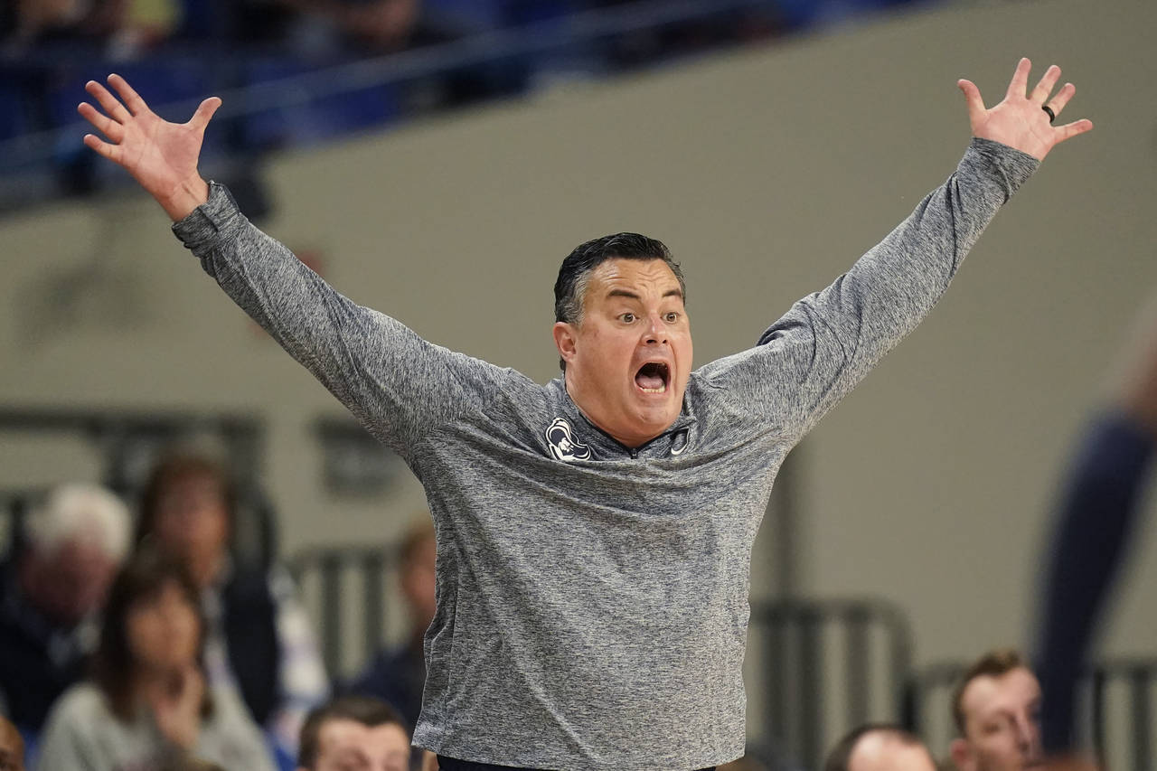 Xavier head coach Sean Miller reacts during the second half of the team's NCAA college basketball g...