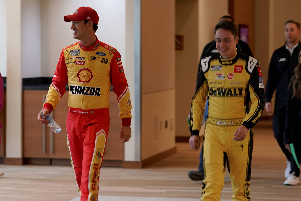 NASCAR Cup Series drivers Joey Logano, left, and Christopher Bell arrive at the NASCAR Championship...