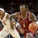 No. 11 Arkansas uses late run to beat Troy, 74-61
