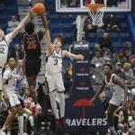 Sanogo leads unbeaten UConn past Delaware State 95-60