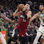 Royal night: Tatum scores 49, Celtics hold off Heat 134-121