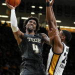 Murray has career night: 31 points, 20 rebounds in Iowa win