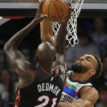 Towns scores 25, Wolves hold on against Heat for 105-101 win