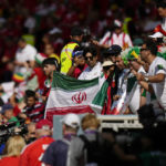 Iran regime supporters confront protesters at World Cup game