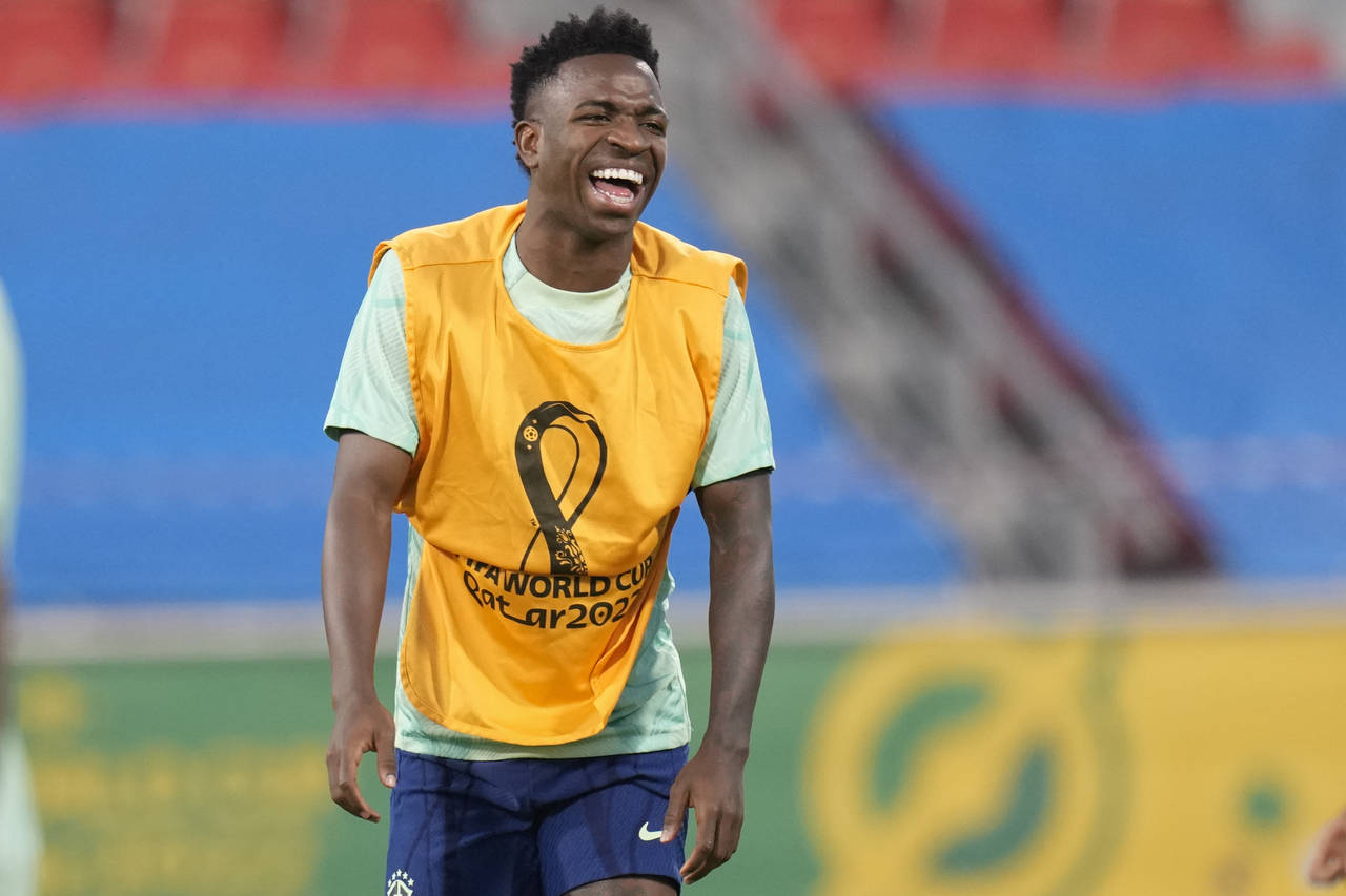 Brazil's Vinicius Junior smiles during a training session at the Grand Hamad stadium in Doha, Qatar...