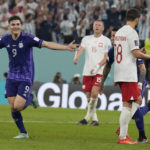 Messi and Argentina advance at World Cup, beat Poland 2-0