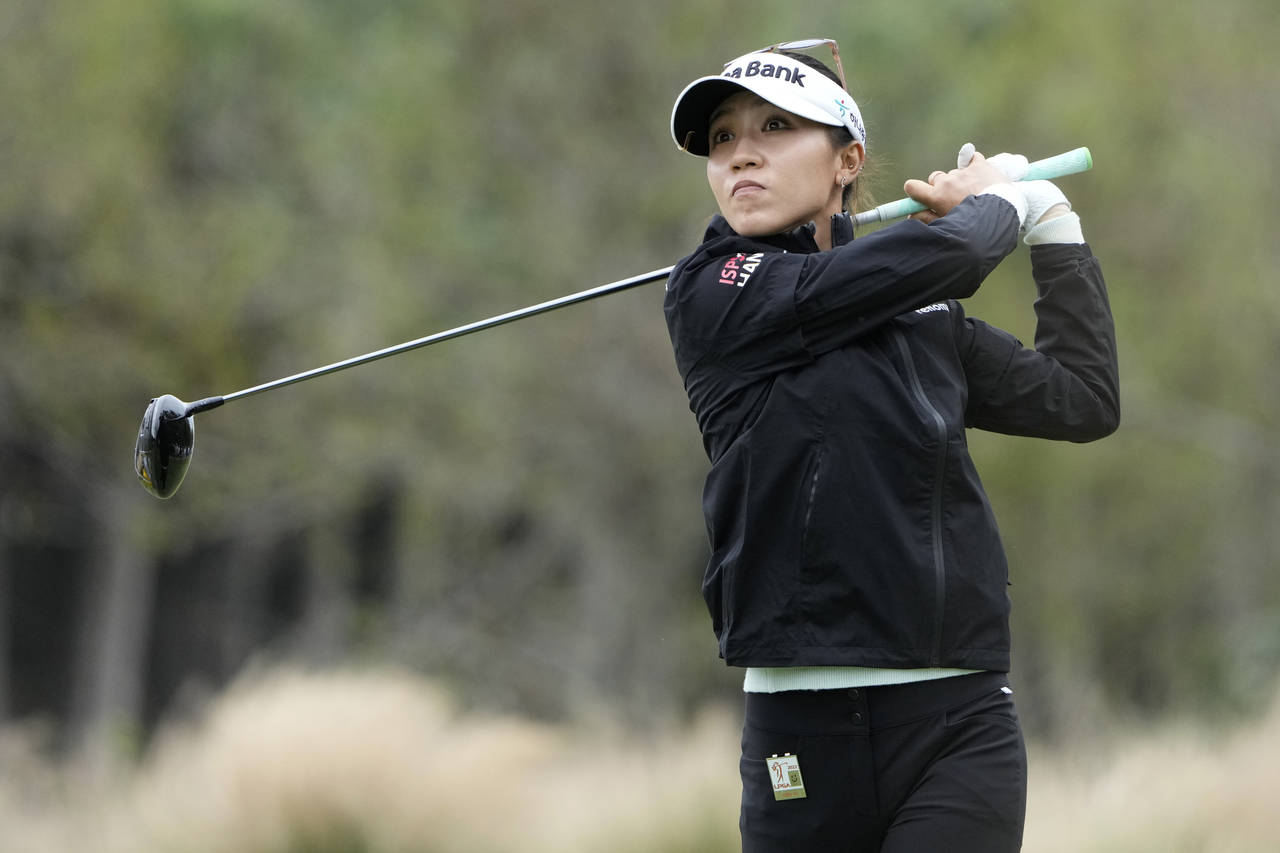 Lydia Ko, of New Zealand, watches her shot from the third tee during the final round of the LPGA CM...