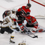 Bruins tie NHL mark for home start; beat Blackhawks, 6-1