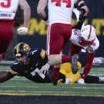 Thompson's three TD passes lead Nebraska over Iowa 24-17