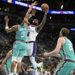 Lakers top Spurs in James' return for first road victory