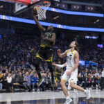 Stephen Curry scores 33 points as Warriors beat Jazz 129-118