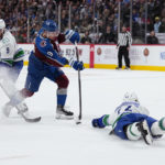Bear scores winner, Canucks rally, surprise Avalanche 4-3