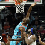 Payne, Booker lead Suns to 116-95 win over Knicks