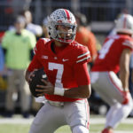 No. 3 Michigan keeps title hopes alive with rout of Ohio St