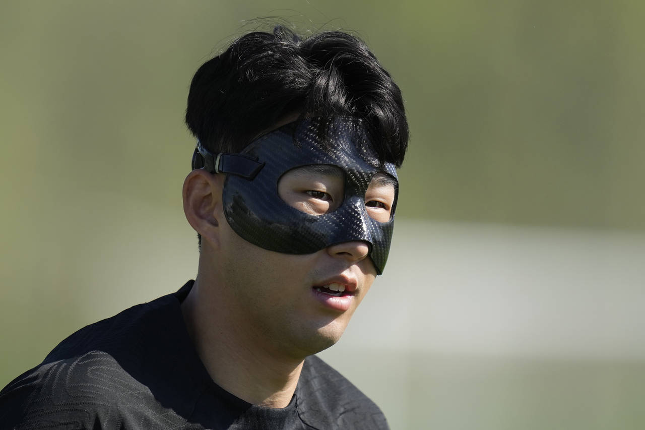 South Korea's Son Heung-min warms up during the South Korea's official training on the eve of the g...