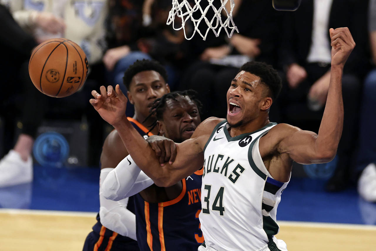 Milwaukee Bucks forward Giannis Antetokounmpo (34) reacts to being fouled by New York Knicks forwar...
