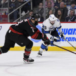 Morrissey's 2nd goal of game lifts Jets past Canes in OT