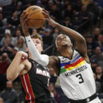 Towns scores 25, Wolves hold on against Heat for 105-101 win
