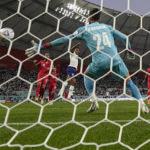 AP PHOTOS: World Cup highlights from Day 2