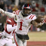 Arkansas rockets past No. 20 Ole Miss behind Sanders' 3 TDs