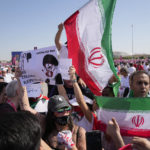 Iran regime supporters confront protesters at World Cup game